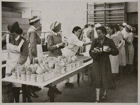  Kulturen Museum - KM 97009: Jewish women are being served meals in sport hall in Lund, 1945