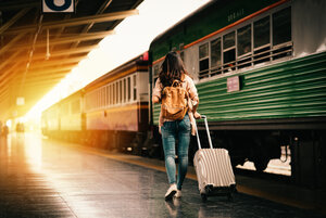 Woman at a train station