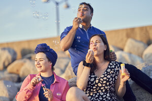 Students blowing bubbles